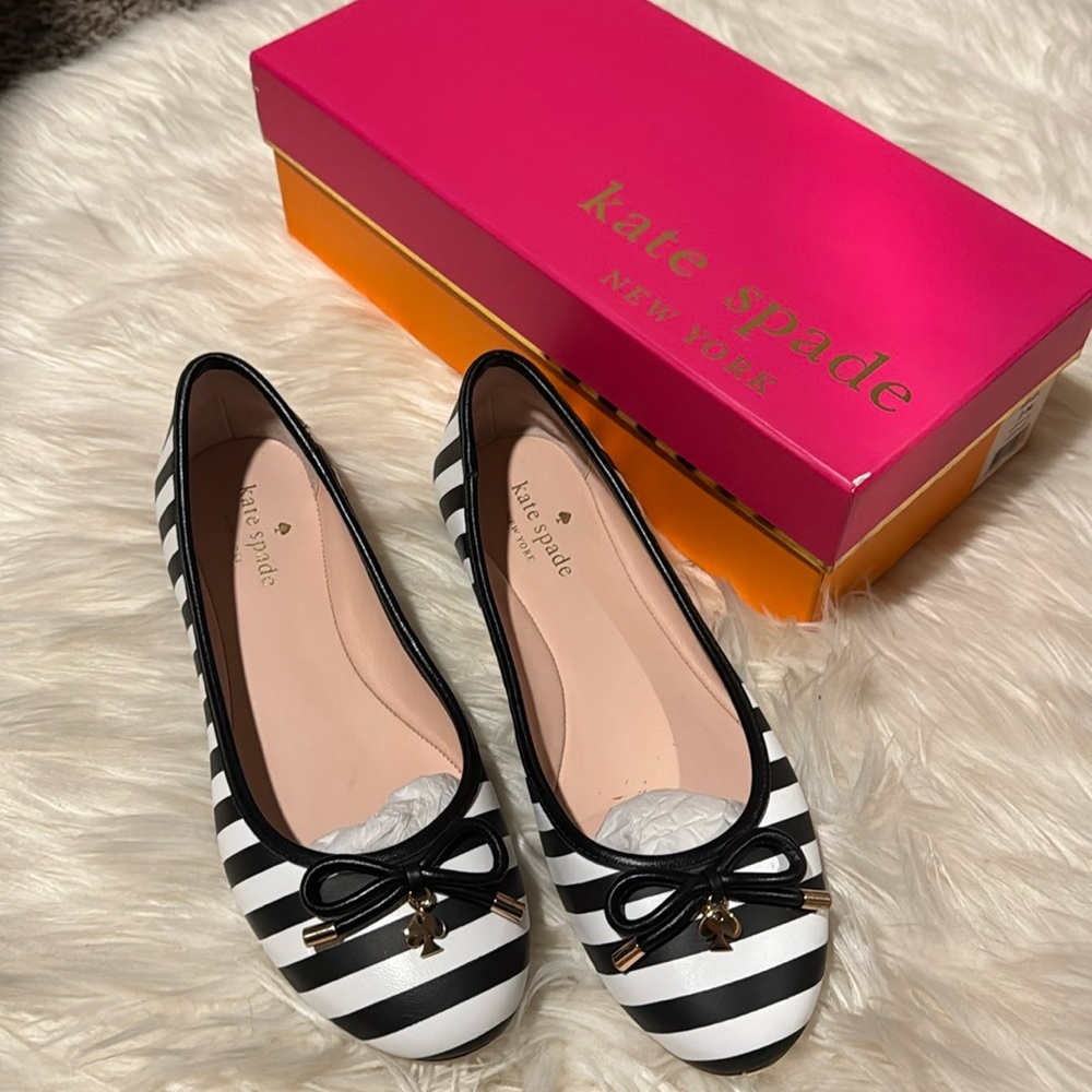 Kate Spade women’s size 7 ballerina flats worn once. Immaculate condition!